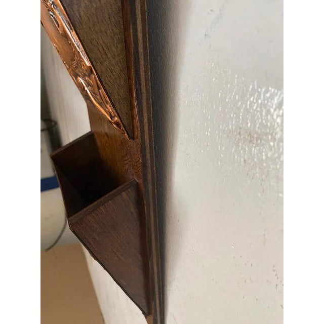 This wall boxes set, is in wood and Copper engraved plates. The colors are brown, and it has been made in France circa 1960.