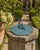 A classic octagonal verdigris iron garden sundial featuring the 12 zodiac signs, inspired by traditional English estate...