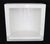 Flush mount square bathroom soap dish made of white porcelain over ceramic. Made by Fairfacts Co. Inc. Good condition with...