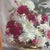 A beautiful mid-century impressionistic floral still life oil painting by celebrated American artist Rudolph Colao...