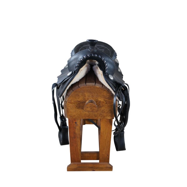 Vintage black and silver tooled leather horse saddle. Originally used at Due Process Horse Stables in NJ. Dimensions: seat...