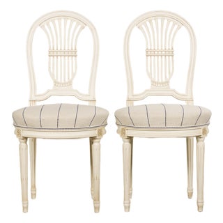 Pair of French Louis XVI Neoclassical Style Painted Lyre Back Accent Chairs in Blue Stripe For Sale