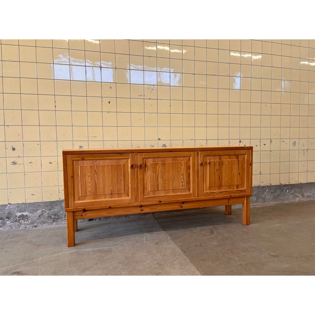 This beautiful Scandinavian buffet cabinet is crafted in solid pine and features an elegant, timeless design that...