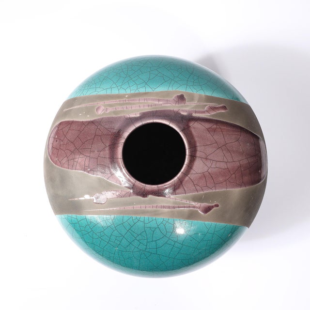 This stunning Mid-Century Modernist ceramic studio art vase by celebrated artist Tony Evans, crafted circa 1980, is a...