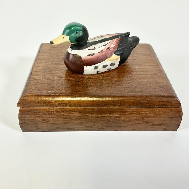 Please Note: the photo error has been reported. This walnut wooden playing card storage box is accented with a hand-...