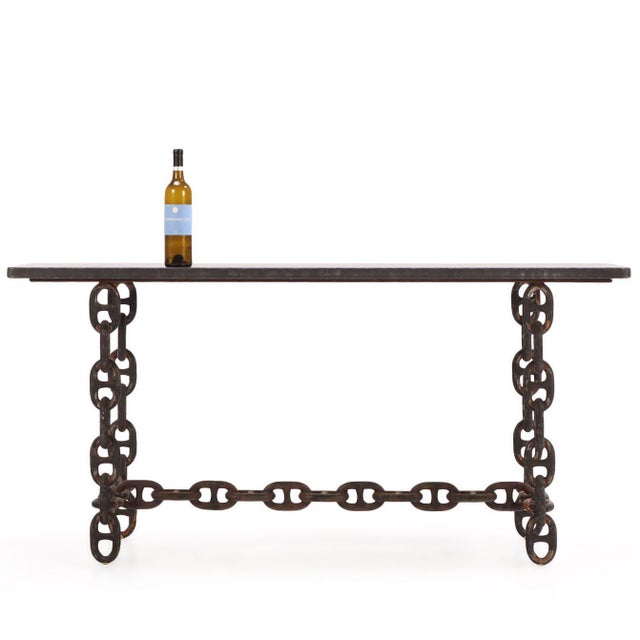 These striking 1970’s blue stone top consoles feature a bold chain link base that commands a notable architectural...