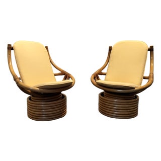 Pair of Vintage Rattan Swivel Chairs For Sale