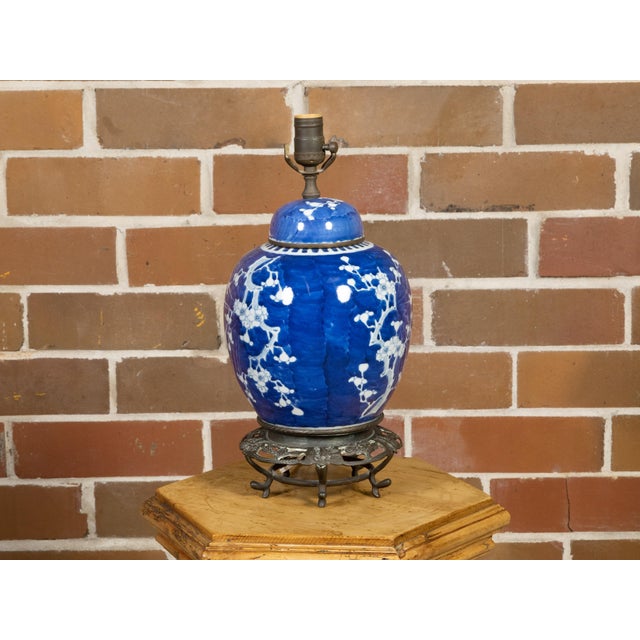 A blue and white Chinese porcelain jar circa 1900 made into a modern table lamp wired for the USA. This stunning circa...