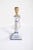 Electrified light fixture in the shape of a candlestick with a square base. In Portuguese ceramics from Candal, polychrome...
