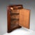 This is a large antique corner cabinet. An English, mahogany over oak free-standing cupboard, dating to the Victorian...