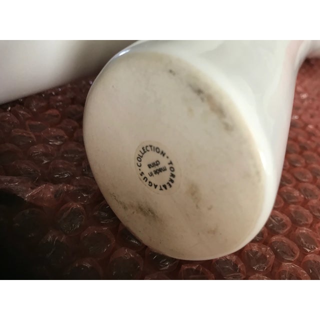 From Torre and Tagus comes a unique contemporary vase in Blanc de Chine white finish Tall:15” Medium; 13” Short: 11” In...