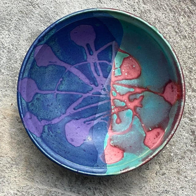 A fantastic vintage Boho studio pottery bowl. Brilliant colors dominate this piece. Fabulous biomorphic design. Acquired...