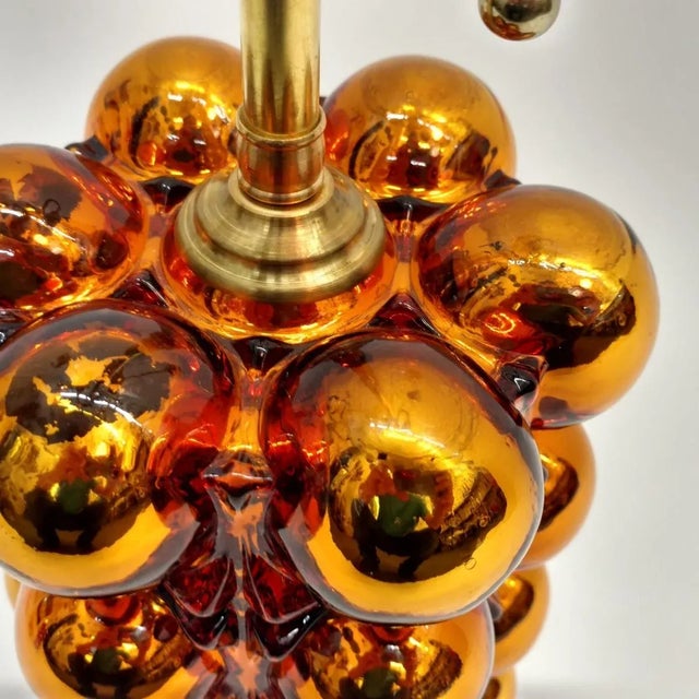 Mid-Century mercury glass lamps. Restored with new pull chain sockets and brass base. Glass stamped 1972. Origin: United...