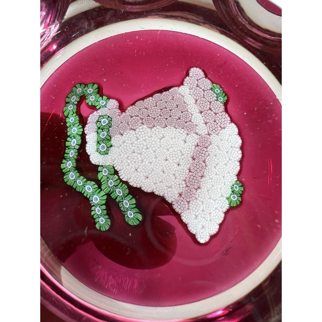 This is an antique Perthshire Christmas Bells glass paperweight from 1977, originating from Scotland. It is a multi-color...