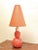 An unusual an very stylish table lamp made of French Alabaster in the colors hell pink and white, beautifully veined. The...