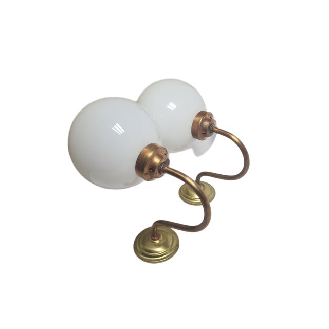 A pair of wall lamps come from the 1950s. They are in good condition. European Plug (up to 250V).The wiring of this item...