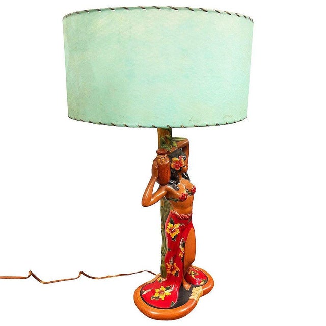 Mid-Century era hand-painted Hawaiian Hula Resin Table Lamp w/ Whipple stitch shade by Santana. The base features a hand-...