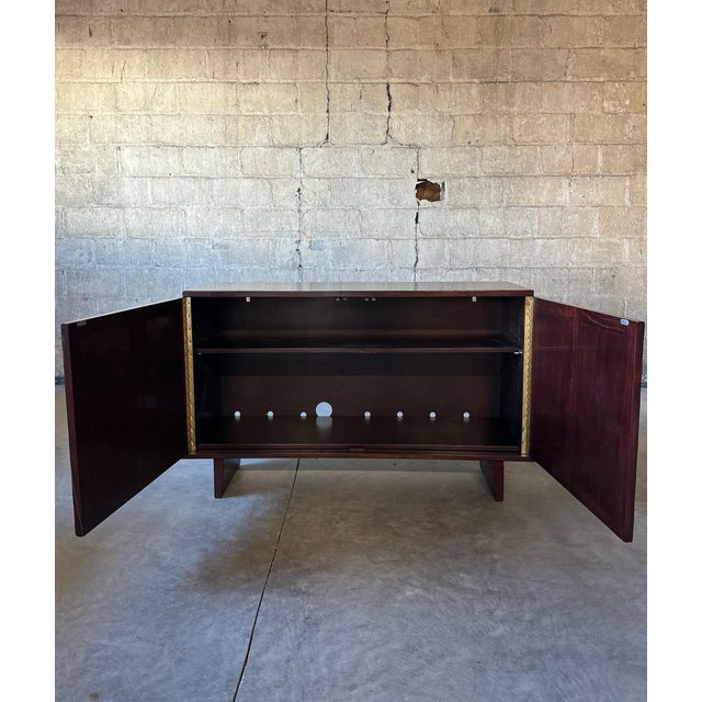 This special piece by Paul Laszlo is made with 100’s of individual tiles laid in an interwoven basket weave pattern. This...