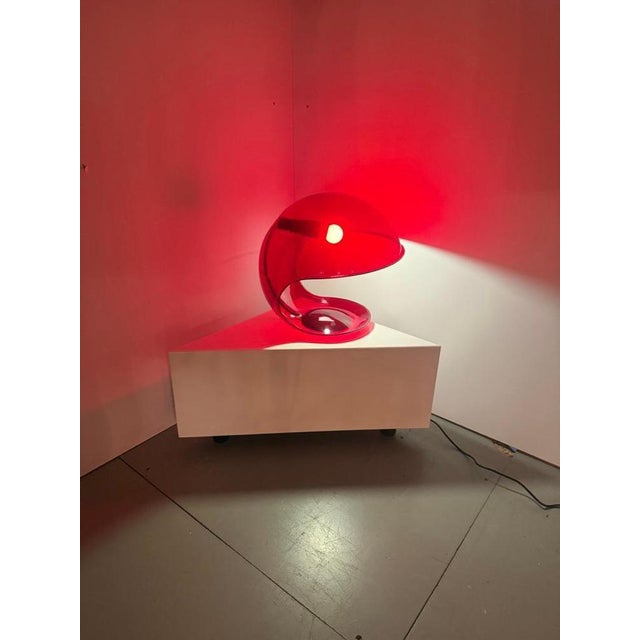 One of the most celebrated creations of Elio Martinelli is the Foglia Lamp, designed in 1969. This piece in transparant...