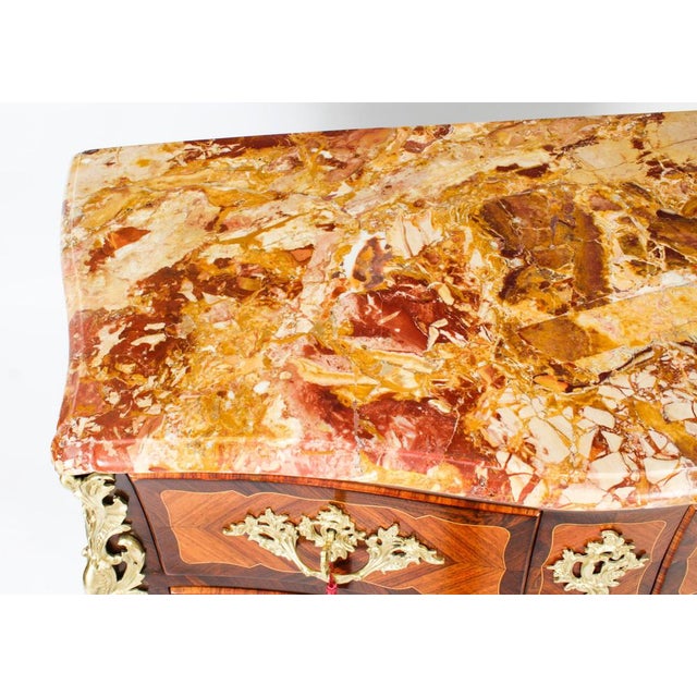 This is a beautiful antique french louis xvi walnut and ormolu mounted commode, circa 1790 in date. It has a stunning...