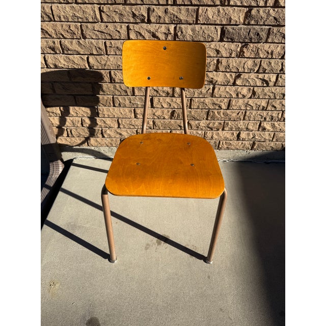 Vintage mid century modern wooden school chair. Curved back and curved front seat. Beautiful wood patina. Well aged piece....