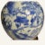 This handsome large Qing Blue and White vase has been drilled for wiring to be used as a lamp. The stand is early 20th...