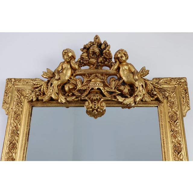 This 19th‑century French Rococo‑style mirror is a richly sculpted piece that captures the opulence and theatrical elegance...