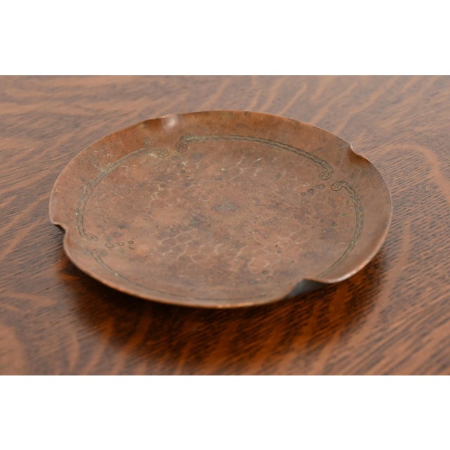 A gorgeous Arts & Crafts period hand hammered copper ashtray or catchall By Roycroft (signed with impressed orb and cross...