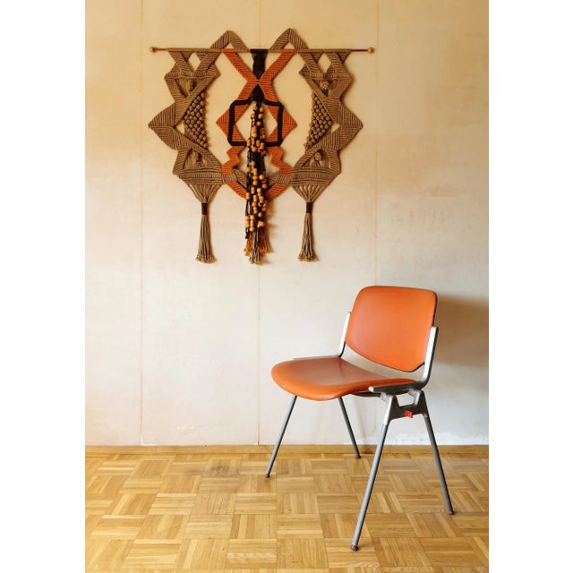 This fantastic wall carpet was made from cotton in Germany in the 1970s. The high-quality, handmade macrame link rug has a...