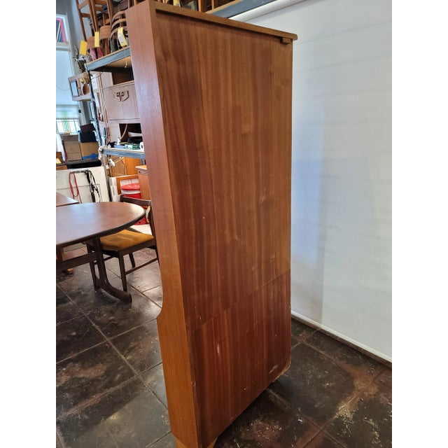 This is a very clean Danish Modern Teak Corner Cabinet Produced by: E. Gomme G-plan. Heavy duty and was made to last....