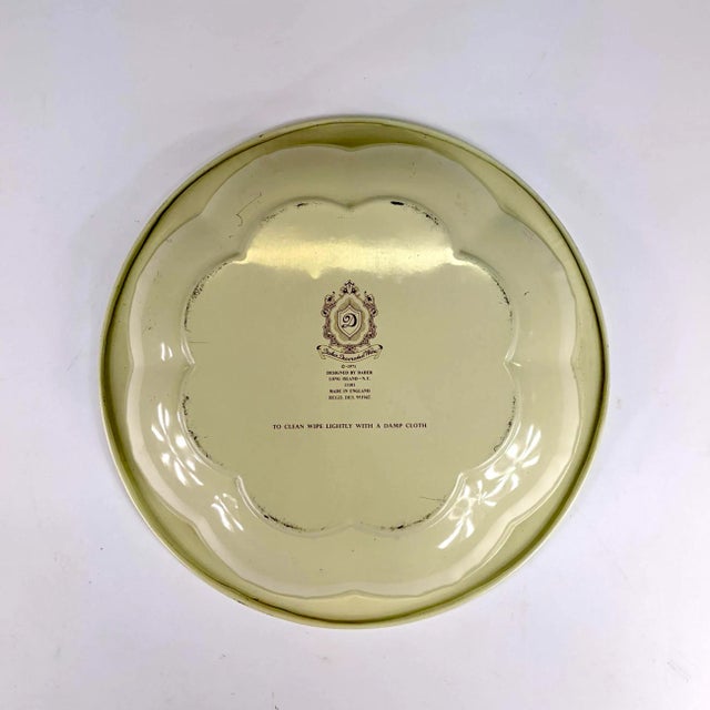 A festive vintage tin plate from Daher (1971) of birds and berries. Made in England