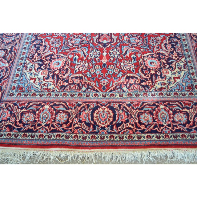 This vintage rug was produced in the 1930s. It is made of dense, hand-woven wool dyed with natural dyes.