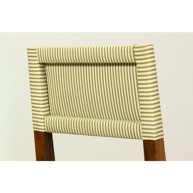 A substantial set of ten 19th century French Louis XIII style dining chairs sourced in Provence, France. The chairs...