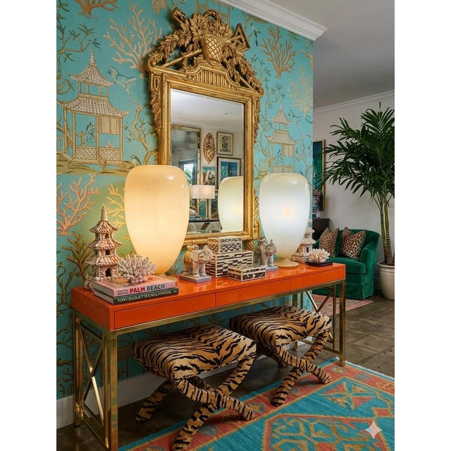 Imagine stepping into a dimly lit, impossibly chic 1970s Hollywood Regency lounge. That is the exact atmospheric mood...