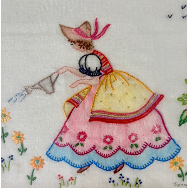 "Mary Mary quite contrary how does your garden grow?" This whimsical hand-embroidered framed hanging features a Southern...