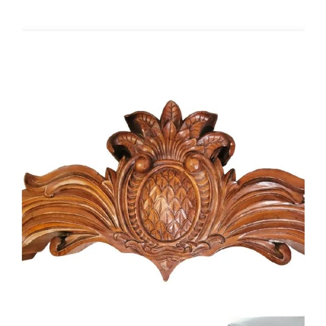 A very large extremely heavy solid wood carved pineapple door topper or wall plaque. This is a perfect piece above a door...