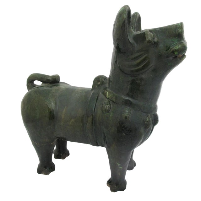 Han Dynasty style, antique reproduction pottery sculpture of a dog. Green glazed terracotta dog stands on all fours with...