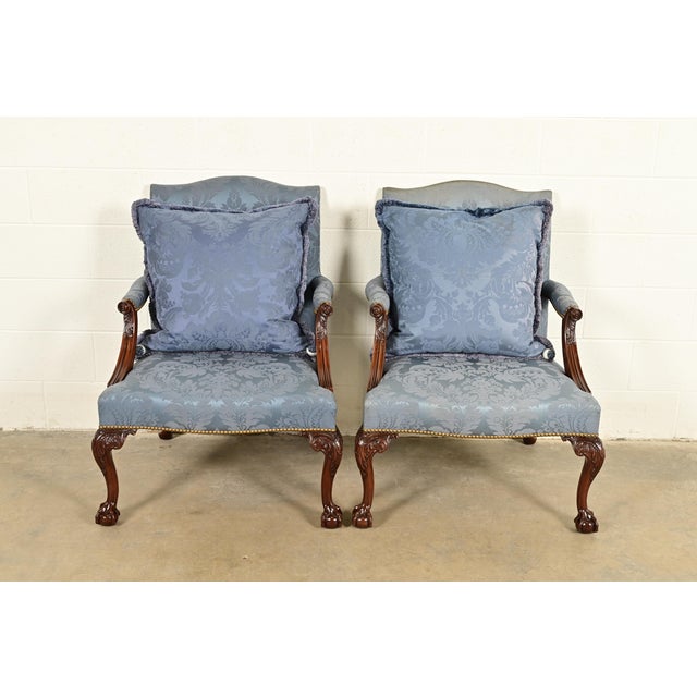 A gorgeous pair of Chippendale or Georgian carved mahogany open arm library chairs or lounge chairs By Kittinger USA, 1991...