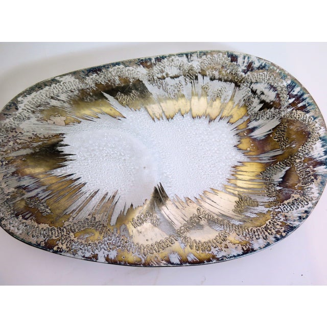Dorothy Thorpe distinguished herself in the 1940s and 50's by creating her own atomic inspired glass ware which was always...