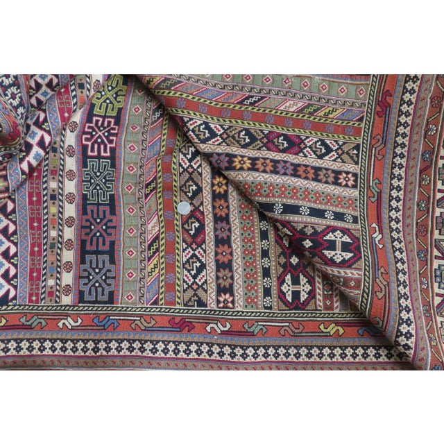 Absolutely beautiful soumak wall hanging! This gorgeous textile dream was loom crafted with sturdy material and died with...