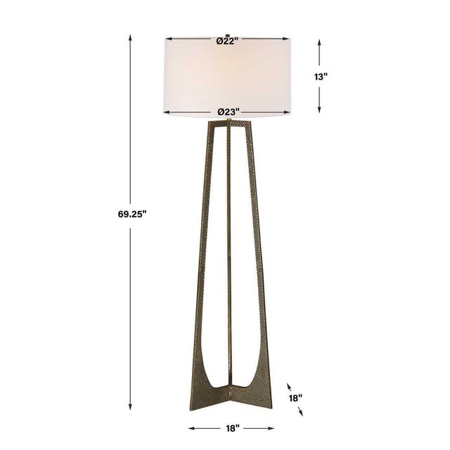 Three hammered cast iron legs join to form a tripod base. The hammered texture body and finial are finished in antique...