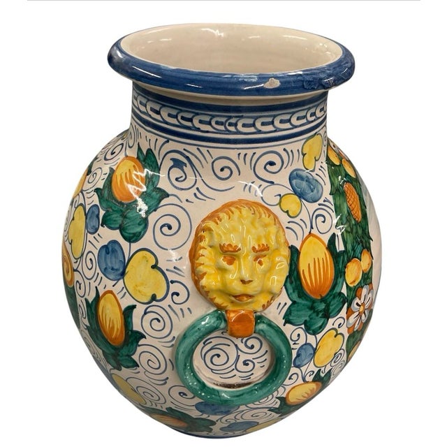 An exceptional and grandly scaled vintage Italian Majolica-style ceramic urn vase, showcasing the rich, historic artistry...