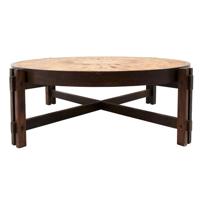 A fabulous find from the Côte d’Azur, this marvelous round coffee table is a signed piece by Roger Capron, who created it...