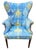 This Vintage Wing Chair – Blue & Chartreuse Ikat Upholstery is a detailed, elegant, and sculptural seating piece that...