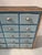 Storage unit in raw and patinated fir 30 patinated drawers with Art Deco handles Top and sides in raw fir Dimensions: H...