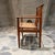 For your consideration, a solid wood frame with a curved spindle backrest and a woven paper cord seat. Made in Denmark...
