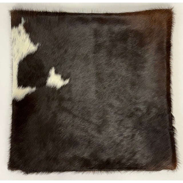 Rich, dramatic, and unmistakably natural, this 18” x 18” pillow cover is crafted from premium Brazilian Watusi cowhide in...