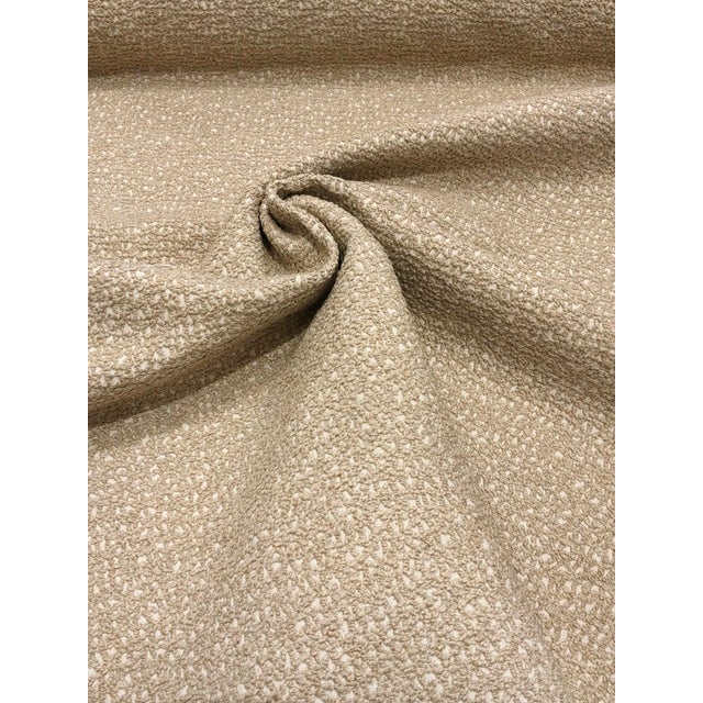 This multipurpose fabric from Kravet has a beige and khaki colorway and a cut woven design. The hand is medium. This...