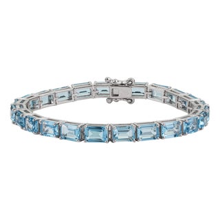 Art Deco Style 26.1 Ct Emerald Cut Blue Topaz Line Tennis Bracelet in Sterling Silver For Sale