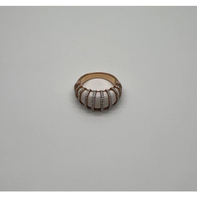 Set with Vertical Cabochon White Agate. Accented by Rows of Sparkling Diamonds G/VS Quality. 18 Karat Rose Gold Band.